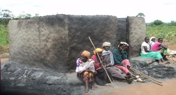 Community members participating in a Rise Up Acholi social transformation program